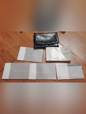 2010 Nissan Pathfinder Owners Manual Set With Leather Case OEM